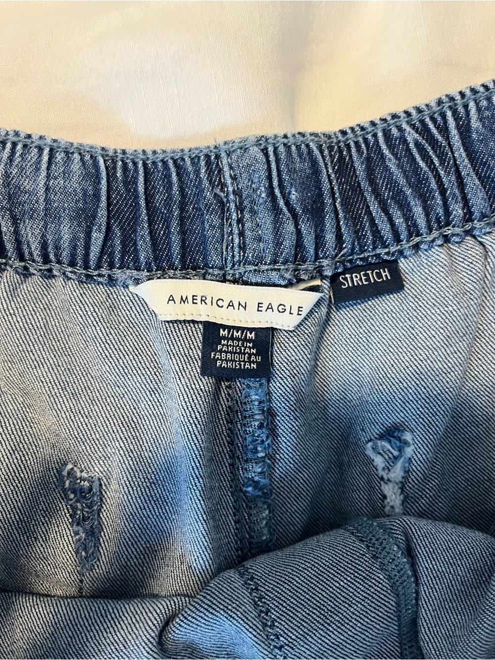 American Eagle Denim Ruffle-Hem Drawstring Shorts - Blue - Picture 4 of 5